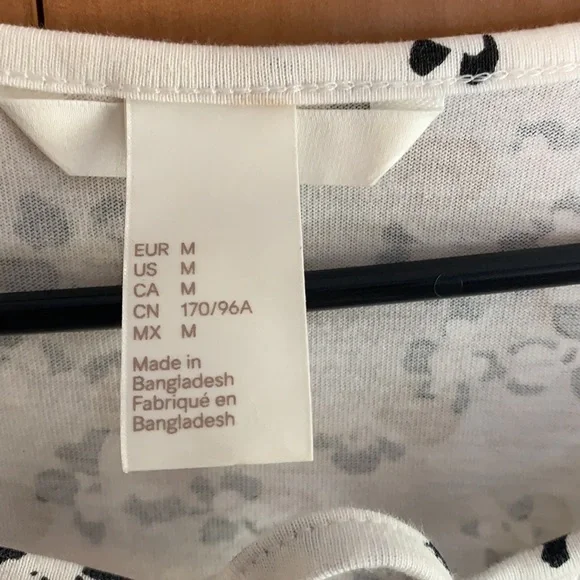 H&M dress. White with tan dots and black flowers. 100% cotton size Medium. - Picture 5 of 8